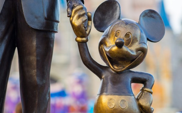 mickey painting walt statue